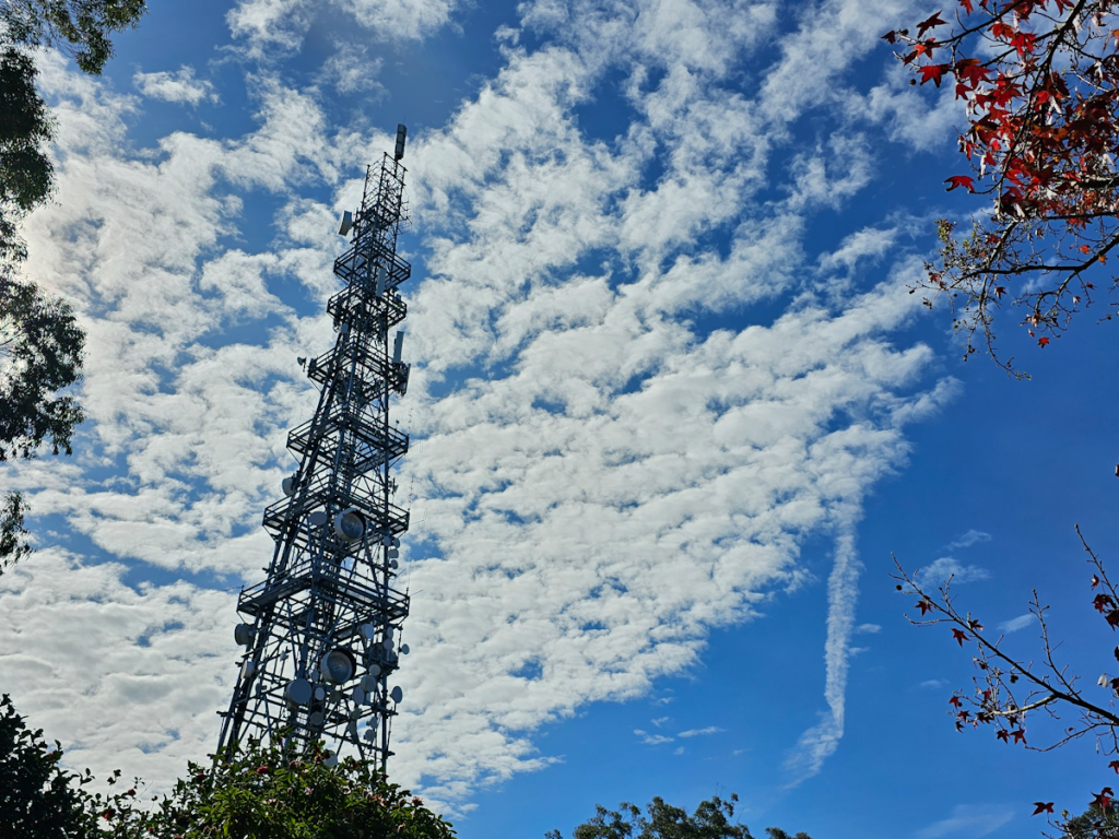 Radio tower with clouds